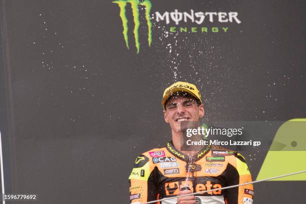 Fermin Aldeguer of Spain and SpeedUp Racing celebrates the victory on the podium during the Moto2 race during the MotoGP of Great Britain - Race at...