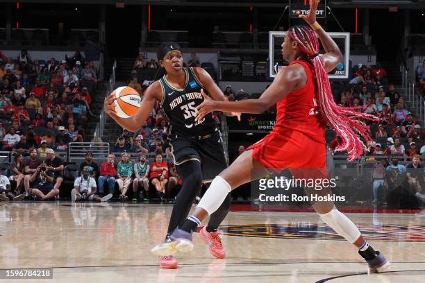 Jonquel Jones of the New York Liberty passes the ball during the game against the Indiana Fever on August 13, 2023 at Gainbridge Fieldhouse in...