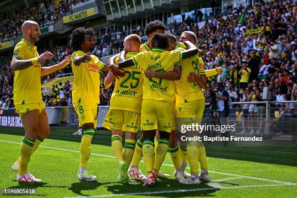 Mostafa MOHAMED of Nantes celebrates his goal with Nicolas PALLOIS of Nantes, Samuel MOUTOUSSAMY of Nantes, Florent MOLLET of Nantes, Moses SIMON of...