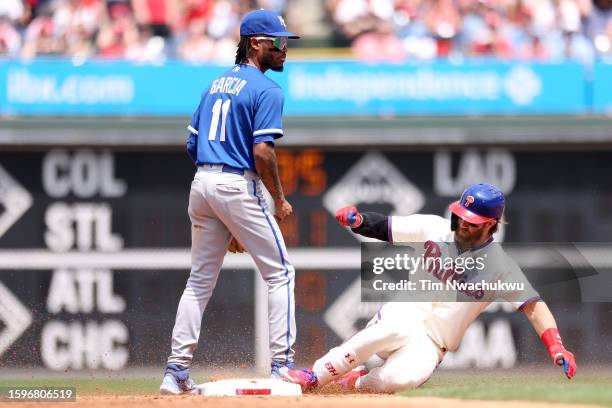 Bryce Harper of the Philadelphia Phillies slides after hitting a double during the first inning against the Kansas City Royals at Citizens Bank Park...