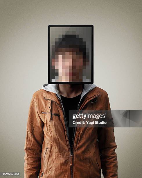 portrait of man with digital tablet - facial recognition technology - fotografias e filmes do acervo