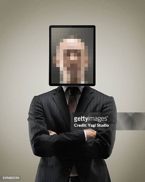 portrait of man with digital tablet - viso nascosto foto e immagini stock