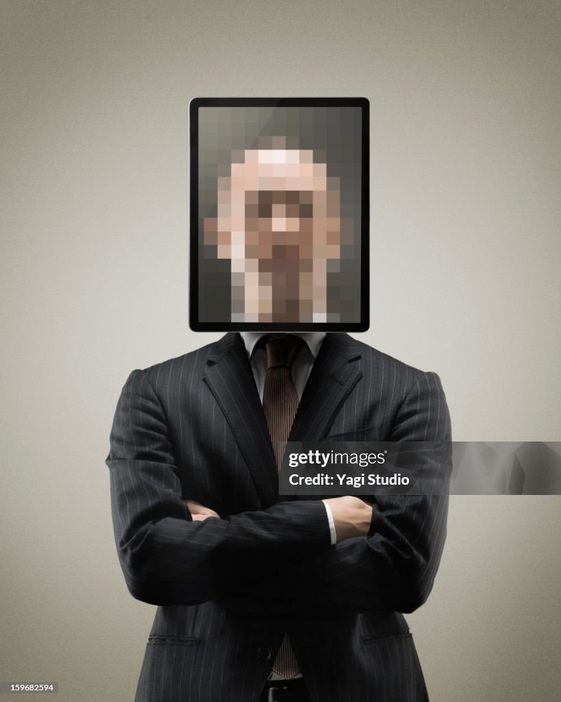 Portrait of man with digital tablet