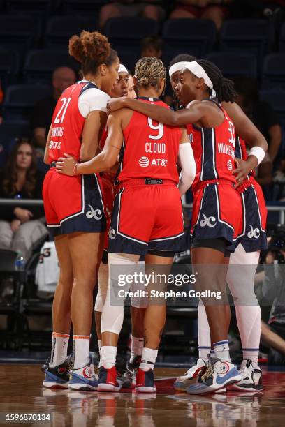 Look at the Washington Mystics team huddle during the game on August 13, 2023 at Entertainment & Sports Arena in Washington, D.C.. NOTE TO USER: User...