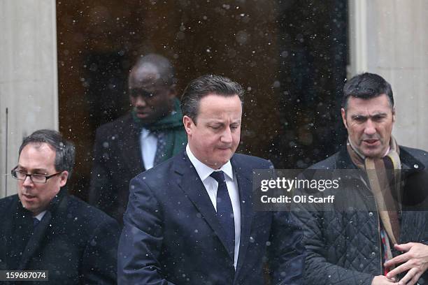 British Prime Minister David Cameron leaves Number 10 Downing Street to travel to the House of Commons to deliver a statement on the unfolding...