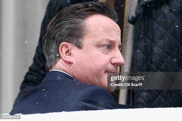 British Prime Minister David Cameron leaves Number 10 Downing Street to travel to the House of Commons to deliver a statement on the unfolding...