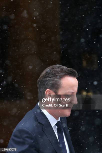 British Prime Minister David Cameron leaves Number 10 Downing Street to travel to the House of Commons to deliver a statement on the unfolding...