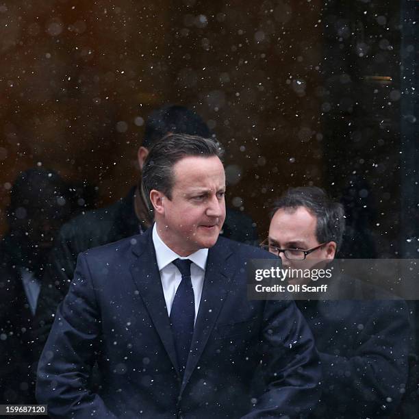 British Prime Minister David Cameron leaves Number 10 Downing Street to travel to the House of Commons to deliver a statement on the unfolding...