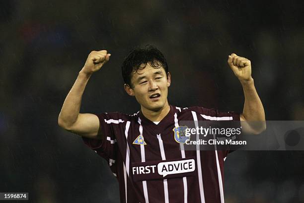 Sun Jihai of Manchester City celebrates victory after the Barclaycard Premiership match between West Bromwich Albion and Manchester City at the...