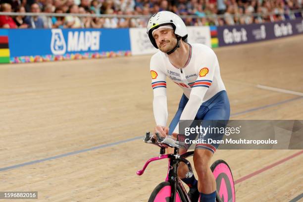 Daniel Bigham of United Kingdom crosses the finish line as second place and silver medal winner during the men elite individual pursuit finals at the...