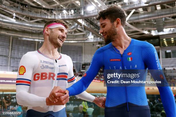 The gold medal winner Filippo Ganna of Italy and the silver medal winner Daniel Bigham of United Kingdom congratulate each other during the men elite...
