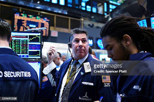 Traders work on the floor of the New York Stock Exchange on January 18, 2013 in New York City. A day after the Standard & Poor's 500-index rose to...
