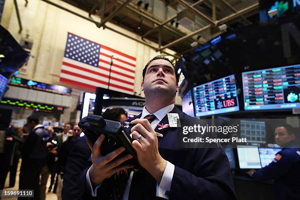 Trader works on the floor of the New York Stock Exchange on January 18, 2013 in New York City. A day after the Standard & Poor's 500-index rose to...