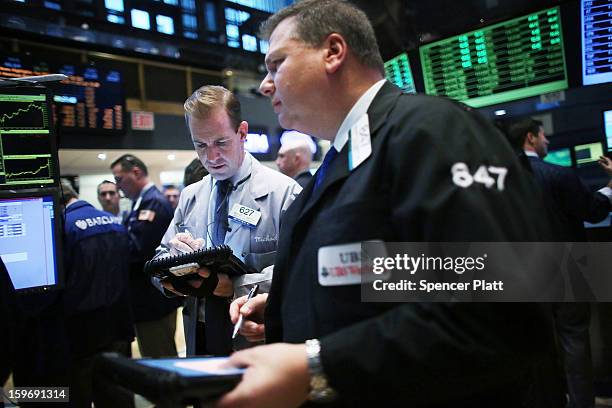 Traders work on the floor of the New York Stock Exchange on January 18, 2013 in New York City. A day after the Standard & Poor's 500-index rose to...