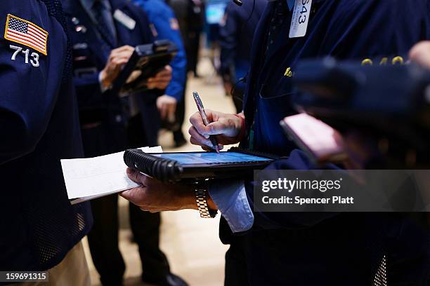 Traders work on the floor of the New York Stock Exchange on January 18, 2013 in New York City. A day after the Standard & Poor's 500-index rose to...