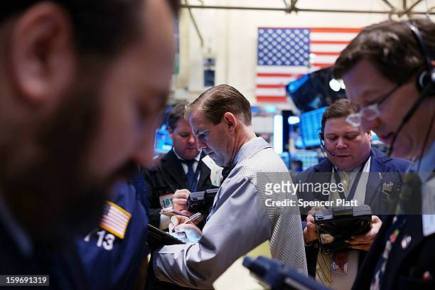 Traders work on the floor of the New York Stock Exchange on January 18, 2013 in New York City. A day after the Standard & Poor's 500-index rose to...