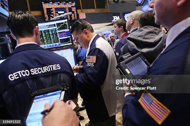 Traders work on the floor of the New York Stock Exchange on January 18, 2013 in New York City. A day after the Standard & Poor's 500-index rose to...