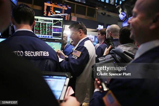 Traders work on the floor of the New York Stock Exchange on January 18, 2013 in New York City. A day after the Standard & Poor's 500-index rose to...