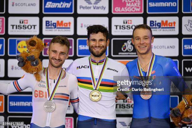 Silver medalist Daniel Bigham of United Kingdom, gold medalist Filippo Ganna of Italy, and bronze medalist Jonathan Milan of Italy, pose on the...