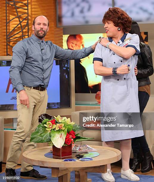 Jason Statham and Raul Gonzalez are seen on the set of Despierta America at Univision Headquarters on January 18, 2013 in Miami, Florida.