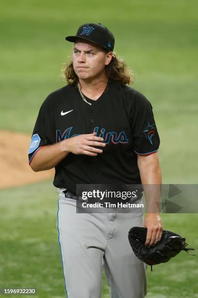 Ryan Weathers of the Miami Marlins walks off the field after the fifth inning against the Texas Rangers at Globe Life Field on August 05, 2023 in...