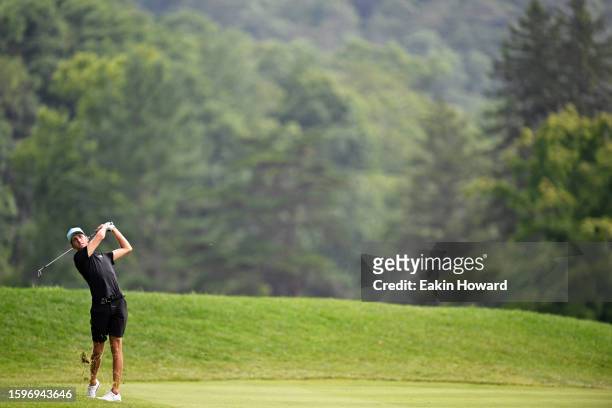 David Puig of Spain plays his second shot of the sixth hole during day three of the LIV Golf Invitational - Greenbrier at The Old White Course on...