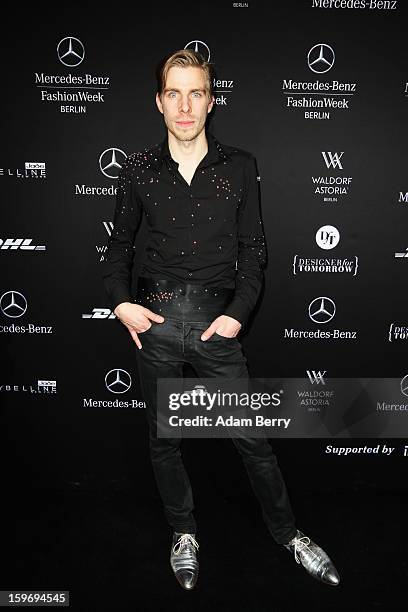 Designer Sebastian Ellrich attends Sebastian Ellrich Autumn/Winter 2013/14 fashion show during Mercedes-Benz Fashion Week Berlin at Brandenburg Gate...