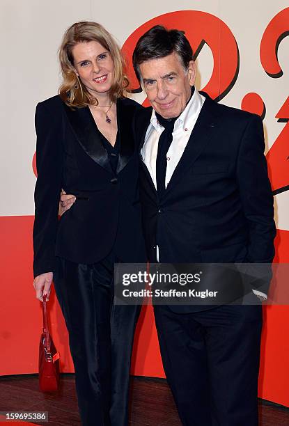 Jazz Musician Rolf Kuehn and his wife Melanie pose on the red carpet as he arrives for the B.Z. Kulturpreis on January 18, 2013 in Berlin, Germany.