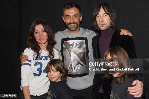 Riccardo Tisci , Bobby Gillespie , Gillespie's sons Wolf and Lux, and ...
