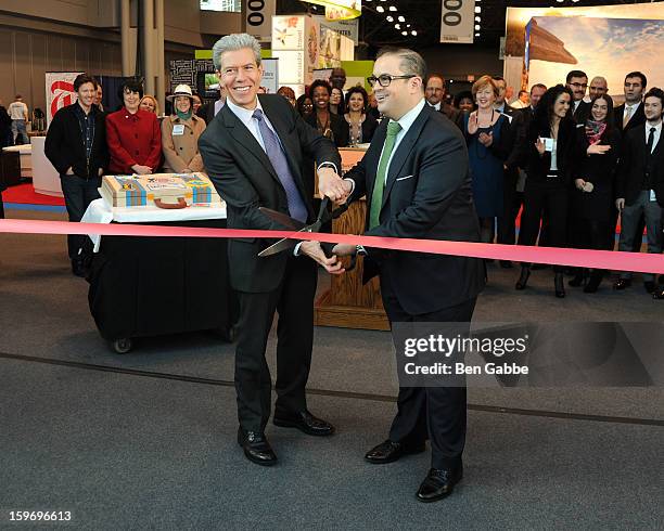 Tony Gonchar and Seth Rogin attend The 10th Annual New York Times Travel Show Ribbon Cutting And Preview at Javits Center on January 18, 2013 in New...