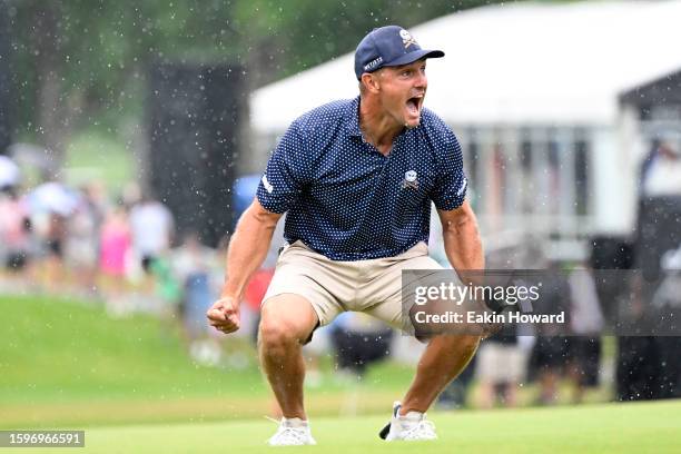 Bryson DeChambeau of the United States celebrates his birdie putt on the 18th hole with a record 58 to win the LIV Golf Invitational - Greenbrier at...