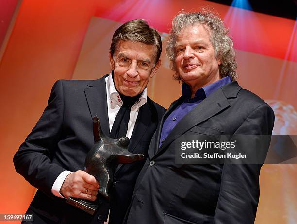 Rolf Kuehn poses with his award and his brother Joachim Kuehn after the show at the B.Z. Kulturpreis on January 18, 2013 in Berlin, Germany.