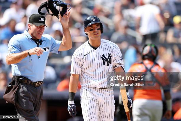 Anthony Volpe of the New York Yankees reacts after a call made by home plate umpire umpire Angel Hernandez during the fifth inning against the...
