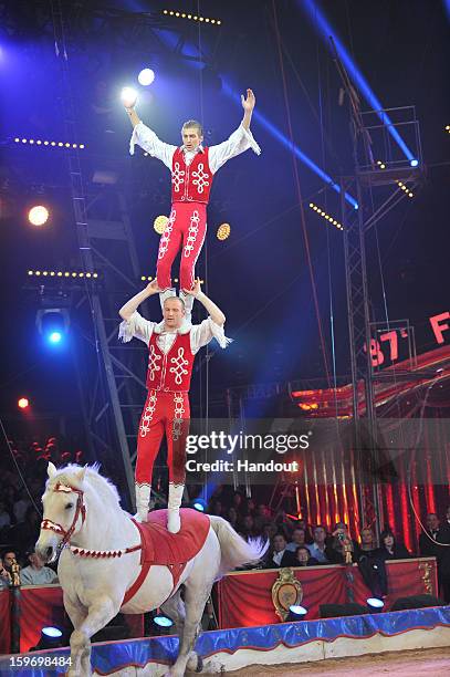 In this handout photo provided by Palais Princier, Performers act on stage during the Monte-Carlo 37th International Circus Festival on January 18,...