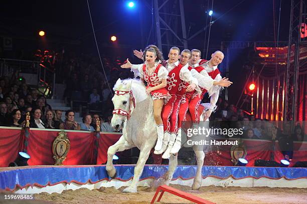 In this handout photo provided by Palais Princier, Performers act on stage during the Monte-Carlo 37th International Circus Festival on January 18,...