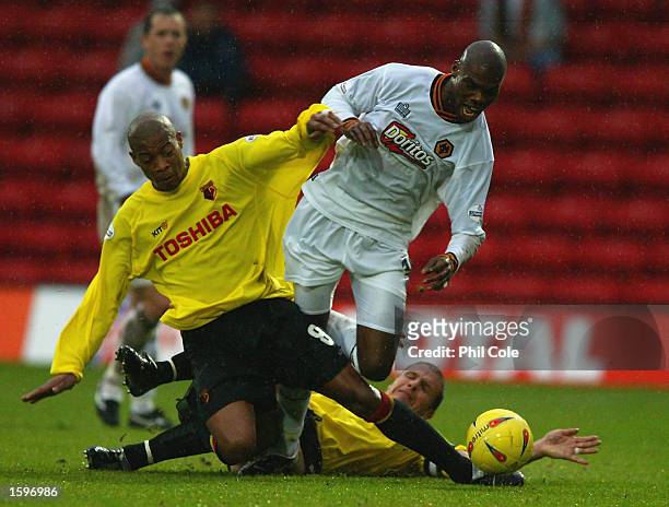 Micah Hyde of Watford brings down George Ndah of Wolverhampton Wanderers during the Nationwide League Division One match held on November 2, 2002 at...