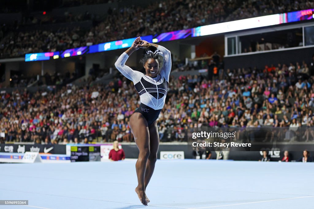 Simone Core Simone Biles competes in the floor exercise during the Core Hydration ...