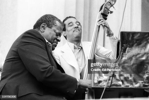 Oscar Peterson performs with Ray Brown during the Berkeley Jazz Festival at the Greek Theatre in May 1978 in Berkeley, California.