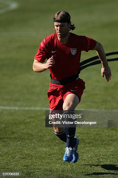 Jeff Parke goes through a strength exercise during the U.S. Men's Soccer Team training session at the Home Depot Center on January 17, 2013 in...