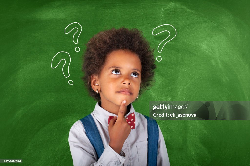Questioning Child Image Child Thinking With Question Mark On Blackboard High-Res Stock Photo ...