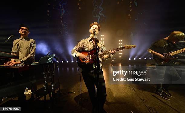 Gus Unger-Hamilton, Joe Newman and Gwil Sainsbury of Alt-J perform on stage at O2 Shepherd's Bush Empire on January 18, 2013 in London, England.