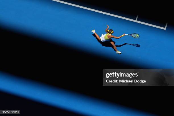 Maria Kirilenko of Russia plays a forehand in her third round match against Yanina Wickmayer of Belarus during day six of the 2013 Australian Open at...