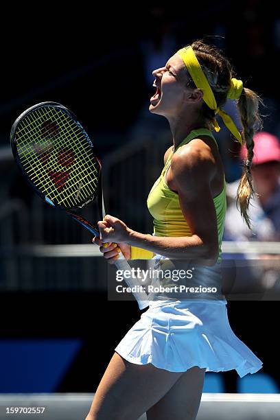 Maria Kirilenko of Russia celebrates winning her third round match against Yanina Wickmayer of Belgium during day six of the 2013 Australian Open at...