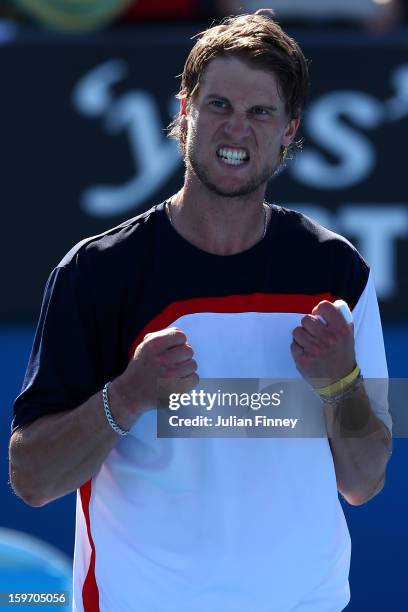 Andreas Seppi of Italy celebrates winning his third round match against Marin Cilic of Croatia during day six of the 2013 Australian Open at...