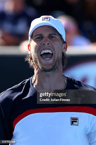 Andreas Seppi of Italy celebrates winning a point in his third round match against Marin Cilic of Croatia during day six of the 2013 Australian Open...