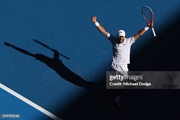 Jeremy Chardy of France celebrates winning his third round match against Juan Martin Del Potro of Argentina during day six of the 2013 Australian...