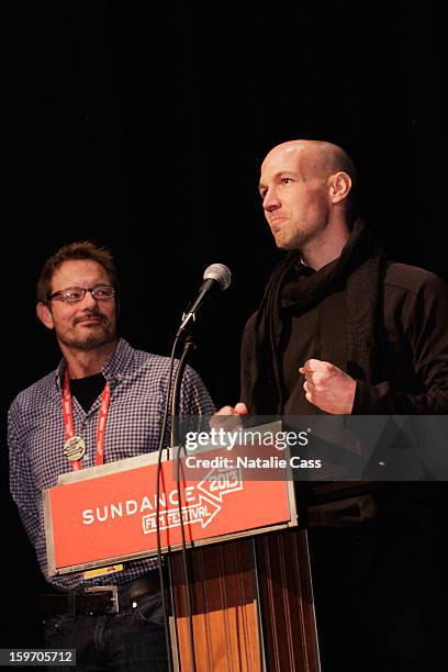 Sundance Film Festival Senior Programmer David Courier and filmmaker/journalist Richard Rowley speak onstage at the "Dirty Wars" Premiere during the...