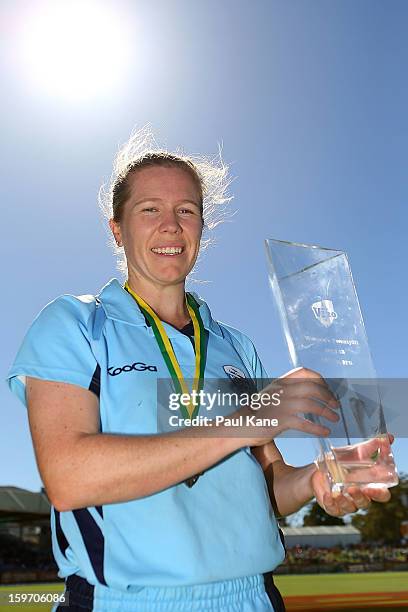 Alex Blackwell of the Breakers poses with the trophy after winning the women's Twenty20 final match between the NSW Breakers and the Western...