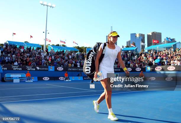 Laura Robson of Great Britain walks from court after losing her third round match against Sloane Stephens of the United States during day six of the...