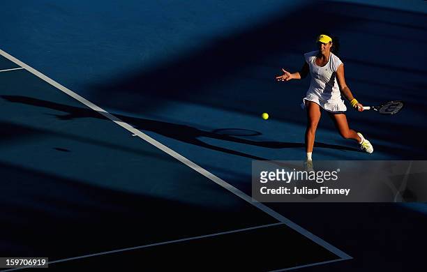 Laura Robson of Great Britain plays a forehand in her third round match against Sloane Stephens of the United States during day six of the 2013...